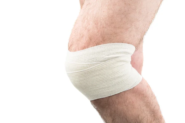 Man met elastische pleister op knie — Stockfoto