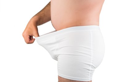Adamın beyaz boxer iç çamaşırı penise işaret üzerinde kapat