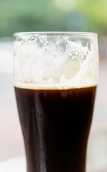 Glasses of dark beer — Stock Photo, Image