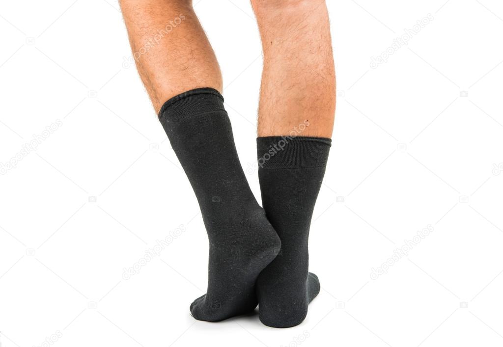 Legs from a businessman without his pants.