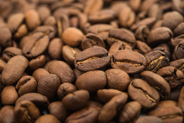 Gebrande koffiebonen achtergrond textuur. — Stockfoto