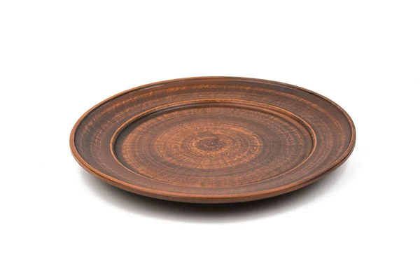 Earthenware dish on a white background — Stock Photo, Image