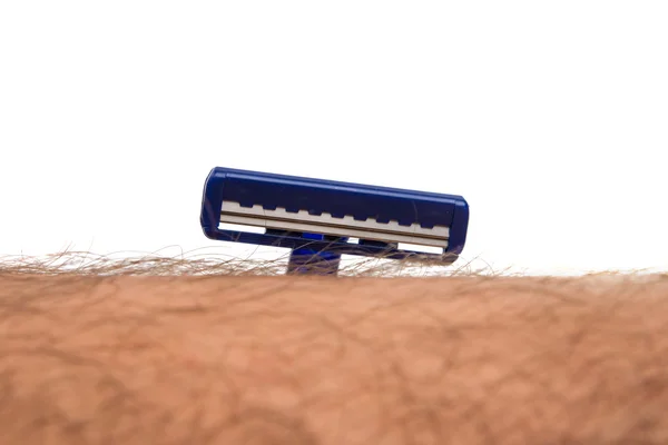 Maquinilla de afeitar y piel humana — Foto de Stock
