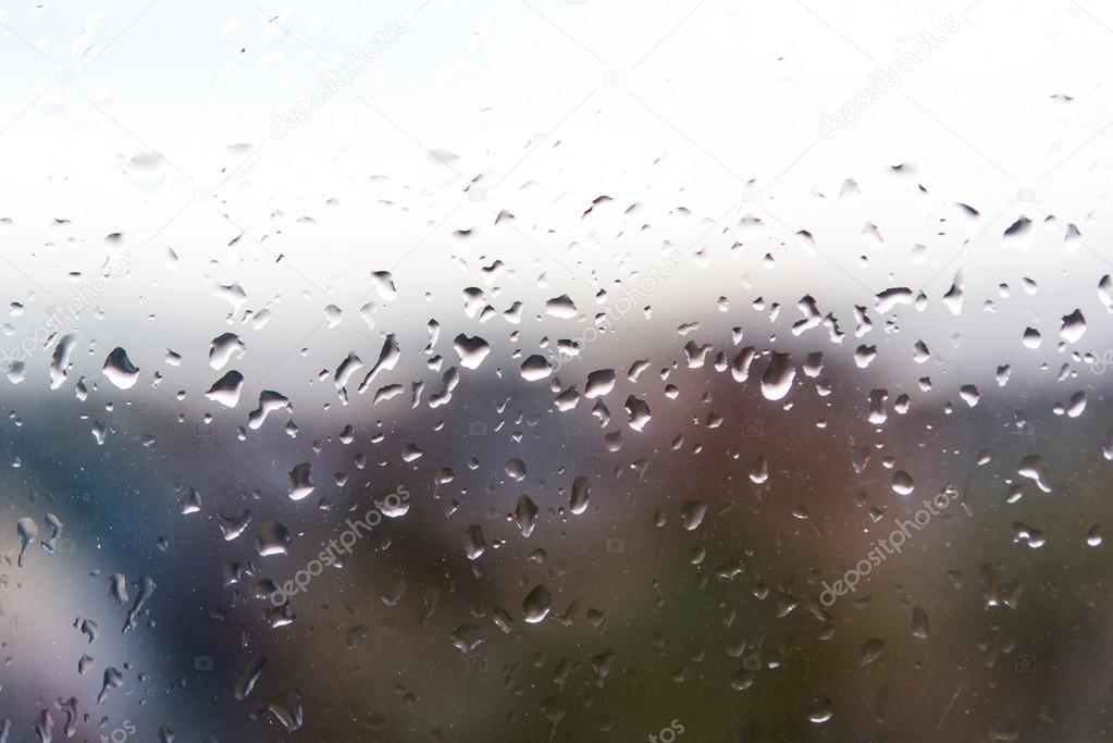 Drops of rain on the train window
