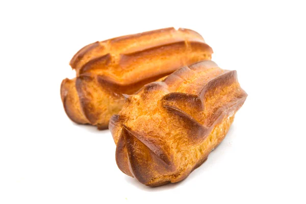 Tårtor eclairs bakgrund — Stockfoto