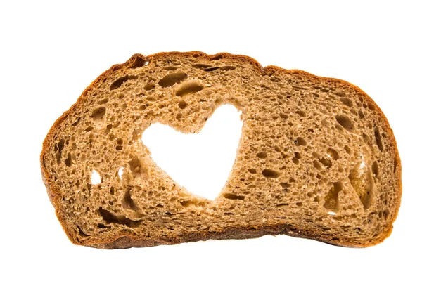 Черный хлеб с сердцем — стоковое фото