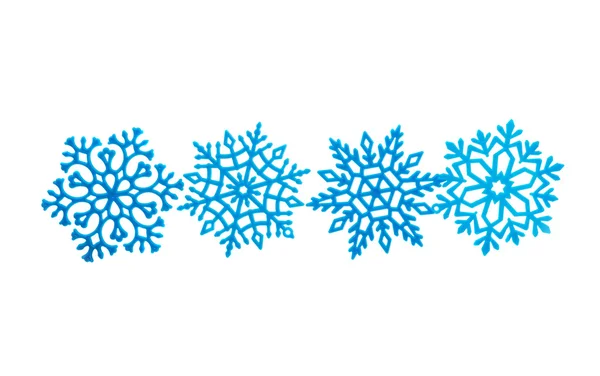 Στούντιο μεγέθυνση του ένα φωτεινό μπλε snowflake στολίδι — Φωτογραφία Αρχείου