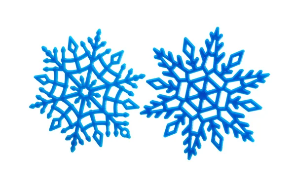 Estúdio close-up de um ornamento floco de neve azul brilhante — Fotografia de Stock