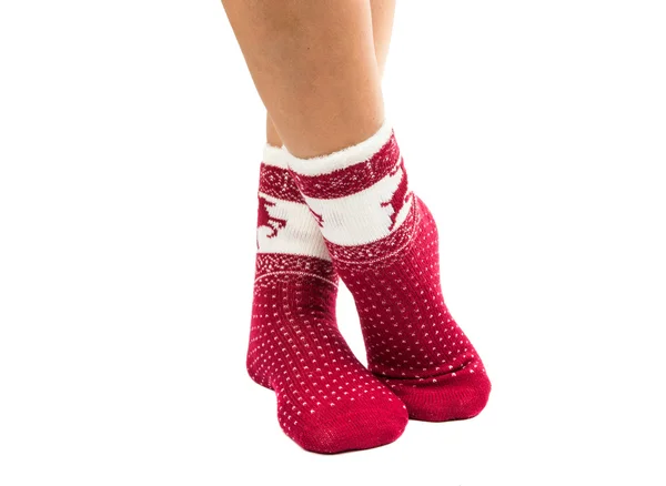 Piernas largas hembra en calcetines a rayas aislados — Foto de Stock