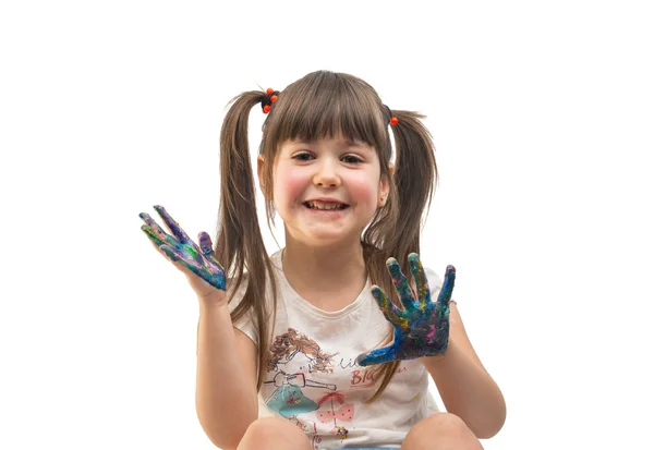 Menina engraçada com as mãos pintadas em tinta colorida — Fotografia de Stock