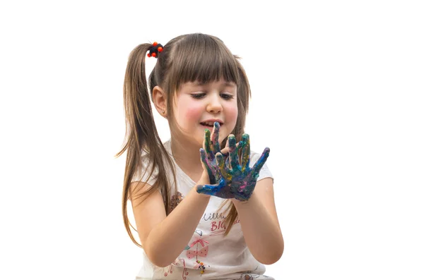 Funny little girl with hands painted in colorful paint — Stock Photo, Image