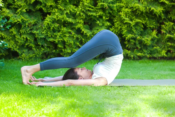 beautiful adult woman doing yoga