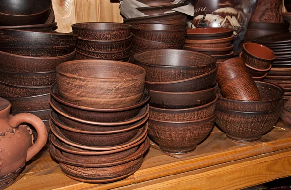 Pottery on wooden table — Stock Photo, Image