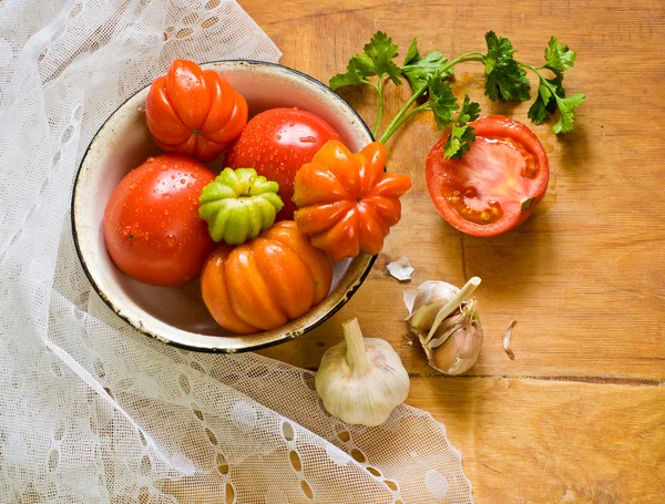 Tomatoes, garlic and parsley — Stock Photo, Image