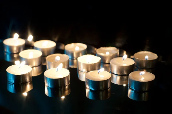 Candles on black — Stock Photo, Image