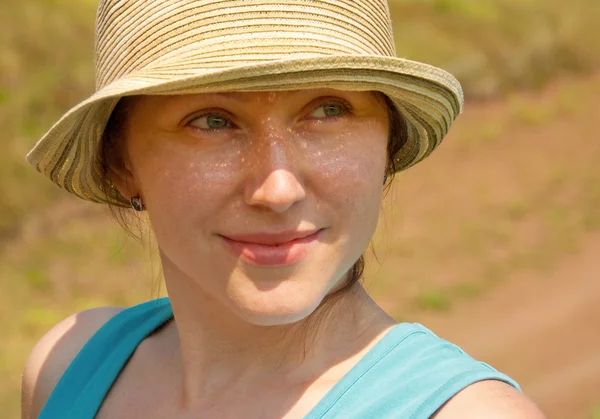 Beautiful woman in a hat — Stock Photo, Image