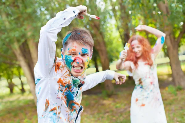 Paintbrush battle on the forest background — Stock Photo, Image