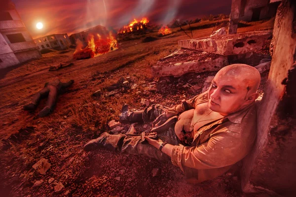 Fat zombie with the gun on the ruined city background. — Stock Photo, Image