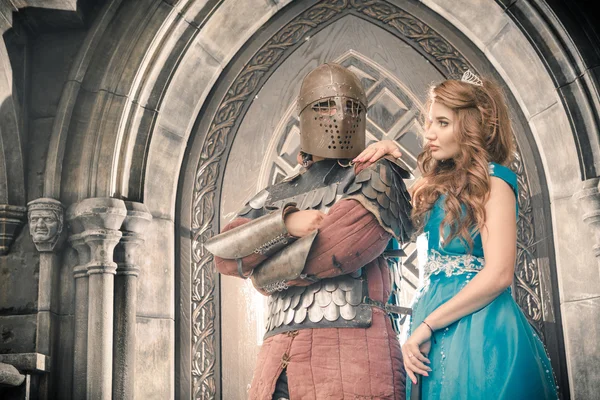 Medieval knight with his beloved lady. — Stock Photo, Image