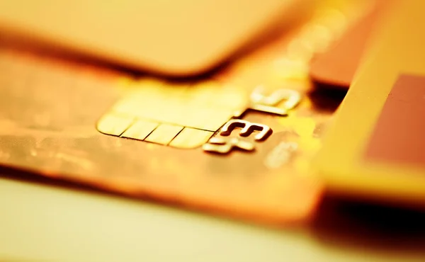 Tarjetas de crédito en color dorado —  Fotos de Stock