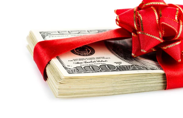 Stack of dollars with red bow — Stock Photo, Image