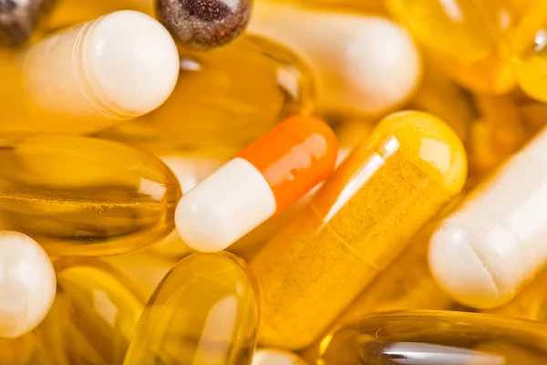 Yellow Assorted pills — Stock Photo, Image