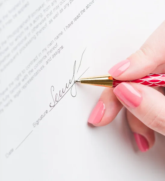 Mano de mujer de negocios con pluma — Foto de Stock