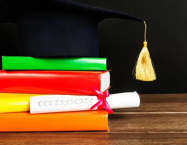 Graduation objects on table