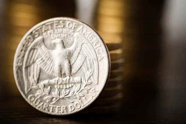 Us quarter dollar coin and gold money — Stock Photo, Image
