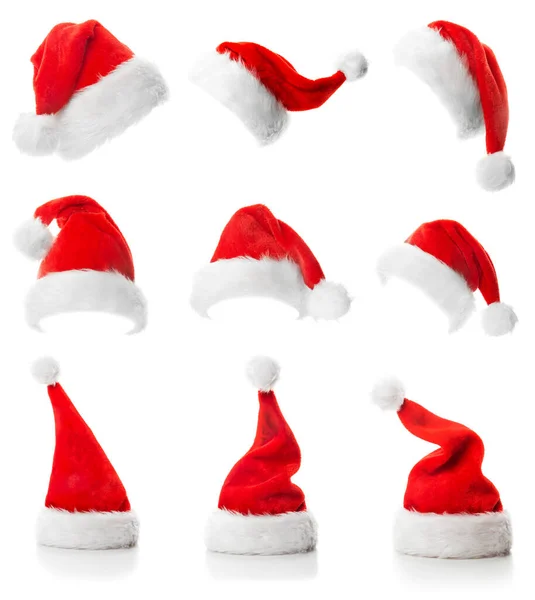 Sombreros Rojos Santa Claus Aislados Sobre Fondo Blanco —  Fotos de Stock