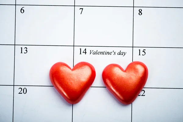 Calendar page with the red hearts — Stock Photo, Image