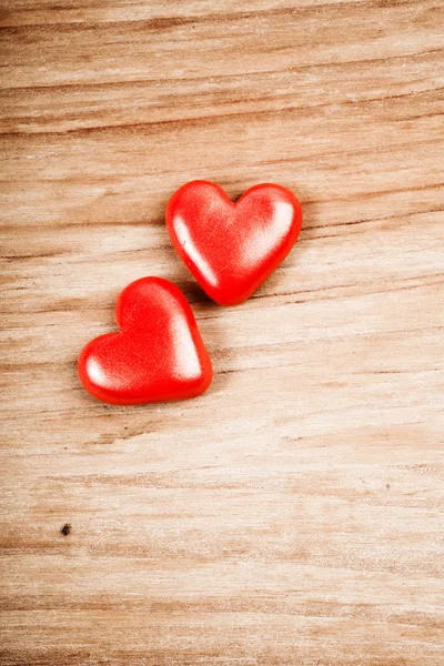 Red hearts on table — Stock Photo, Image