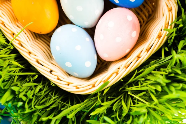 Easter eggs in basket — Stock Photo, Image