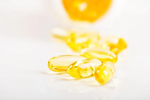 Yellow fish oil capsules — Stock Photo, Image
