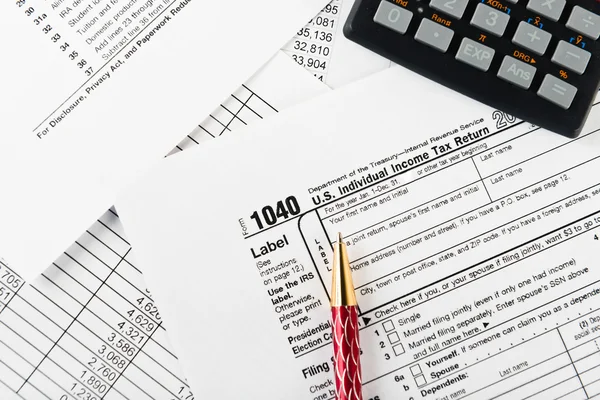 Tax income data and calculator Stock Photo