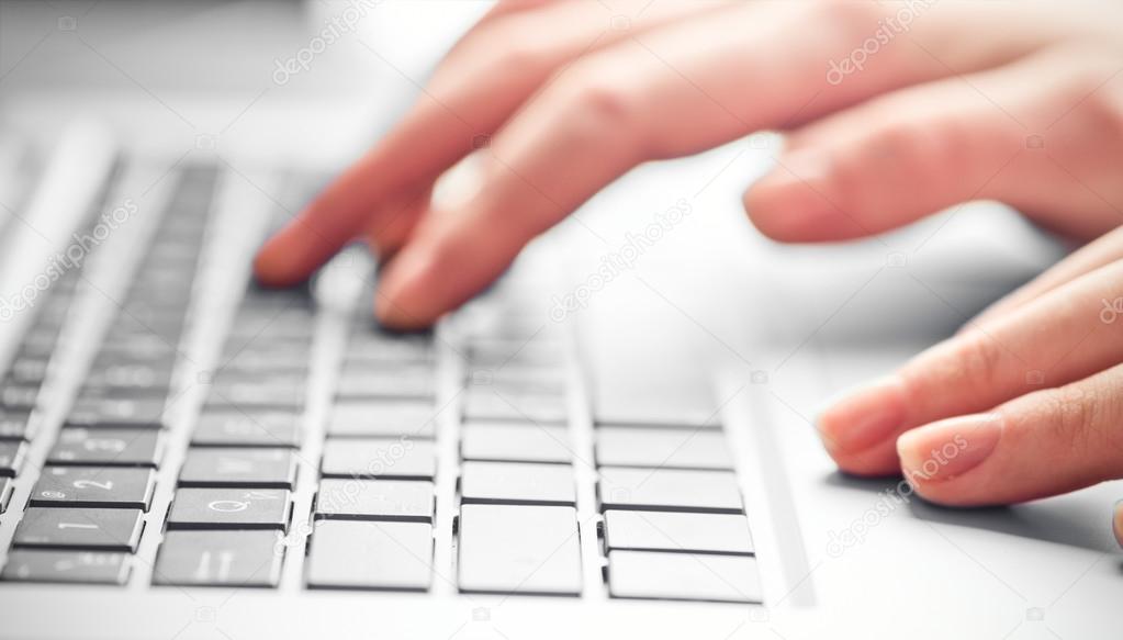 Female  hands on keyboard