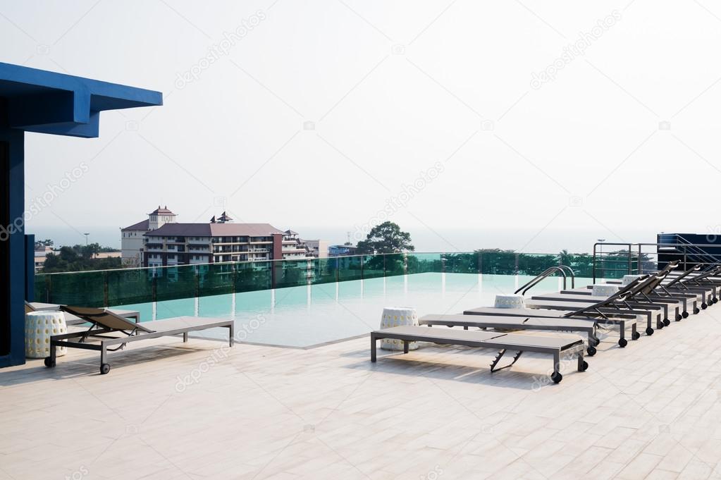 Swimming pool on roof deck building.