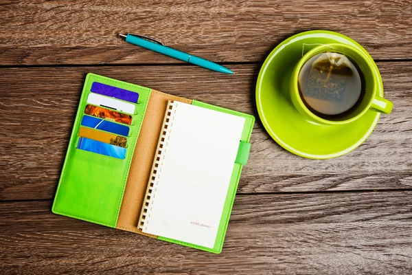 Cup of tea, pen,  organizer — Stock Photo, Image