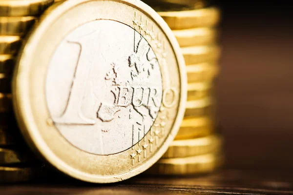 One euro coin and gold money — Stock Photo, Image
