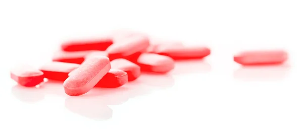 Group of pink medical pills Stock Picture