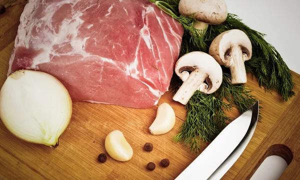 Raw fresh meat on board — Stock Photo, Image