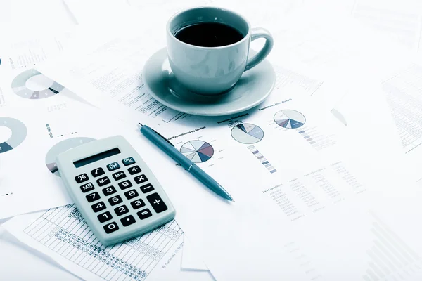 Business reports. Cup of coffee on documents. — Stock Photo, Image