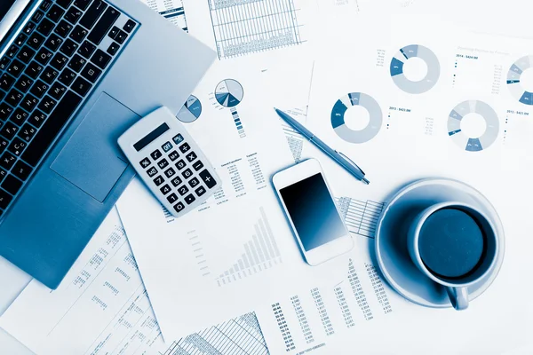 Business workplace with financial reports — Stock Photo, Image
