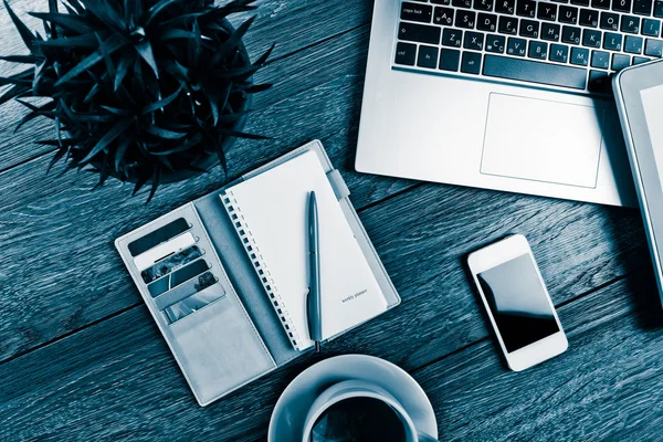 Office desk with laptop computer — Stock Photo, Image