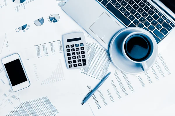 Business workplace with financial reports — Stock Photo, Image