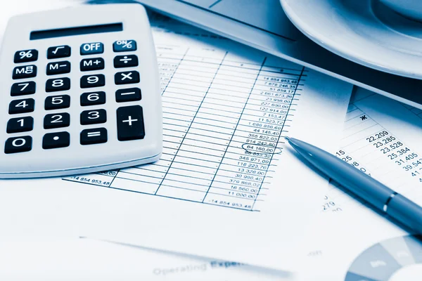 Calculator on the financial documents Royalty Free Stock Images