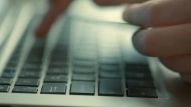 Woman using computer for online purchase