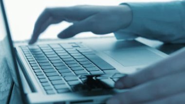 Woman using computer for online purchase