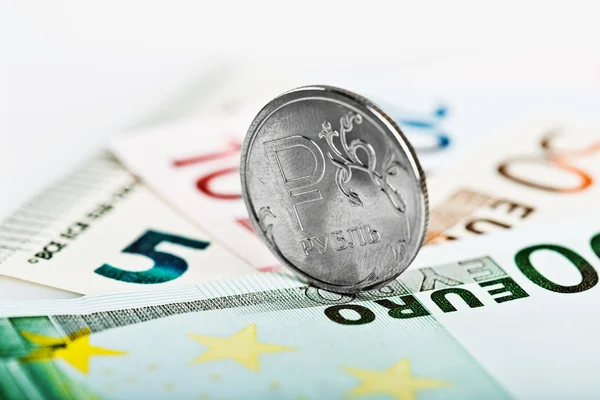 Russian ruble coin on euros — Stock Photo, Image