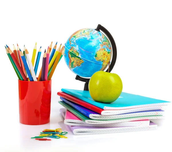Globe, notebook stack and pencils — Stock Photo, Image